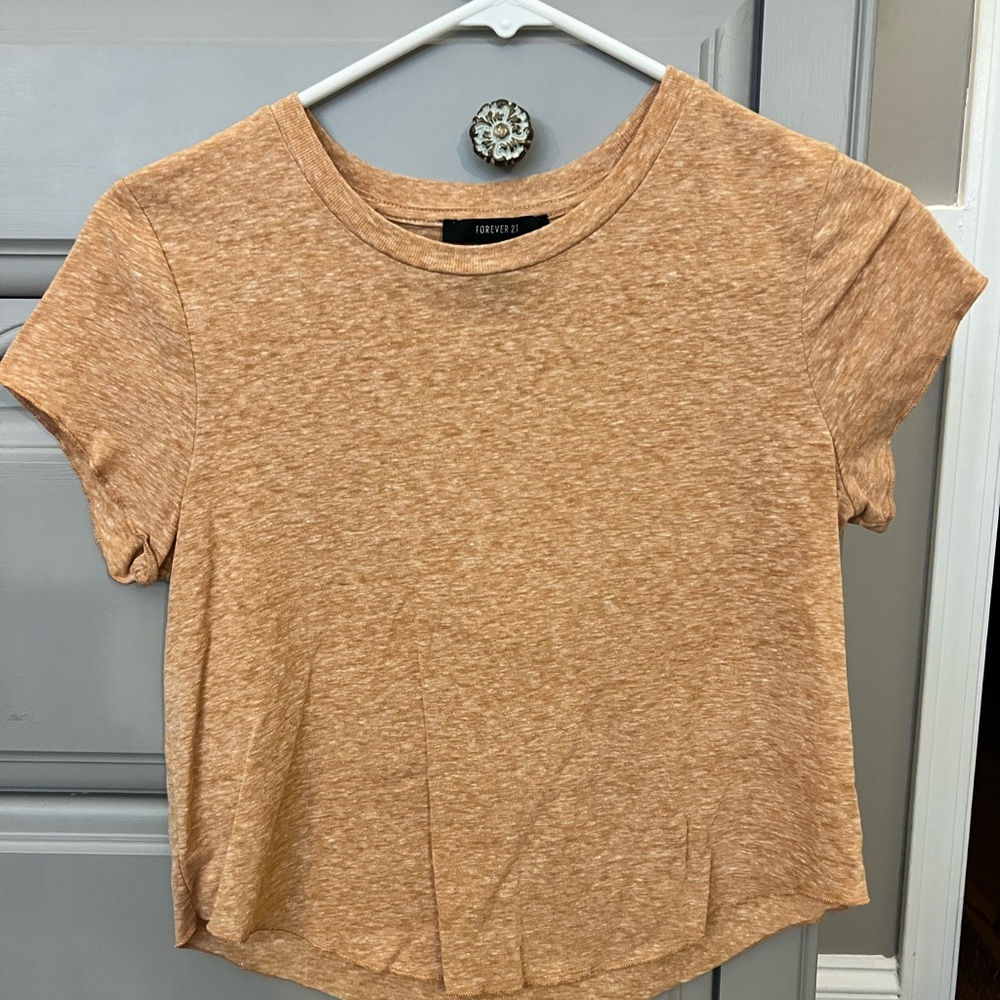 Size small orange cropped short sleeve shirt, great condition.